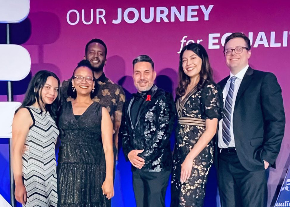 Sempra Employees accepting the No. 1 utility company for workplace fairness award