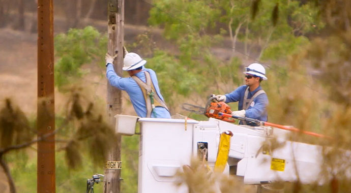 SDG&E team members replace wooden poles with fire-resistant steel ones