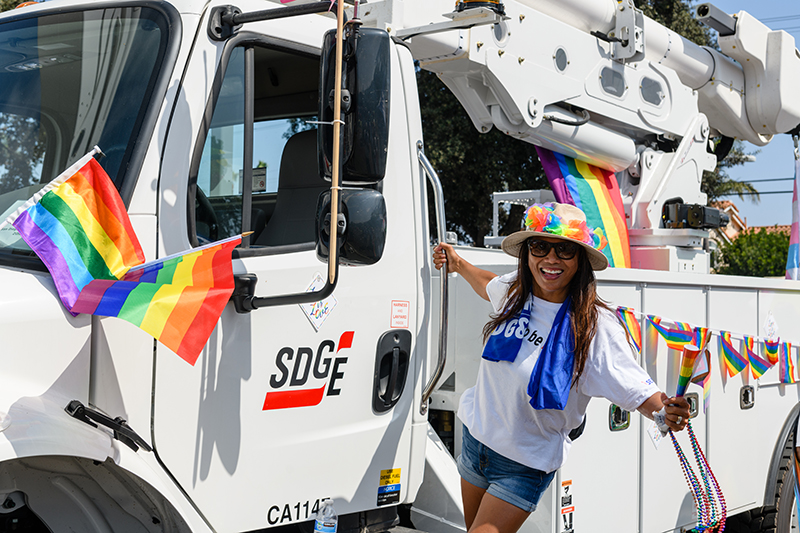A team member celebrates during the 2022 San Diego Pride parade