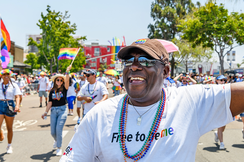 Mitch Mitchell leads employees and their families during the 2022 San Diego Pride parade