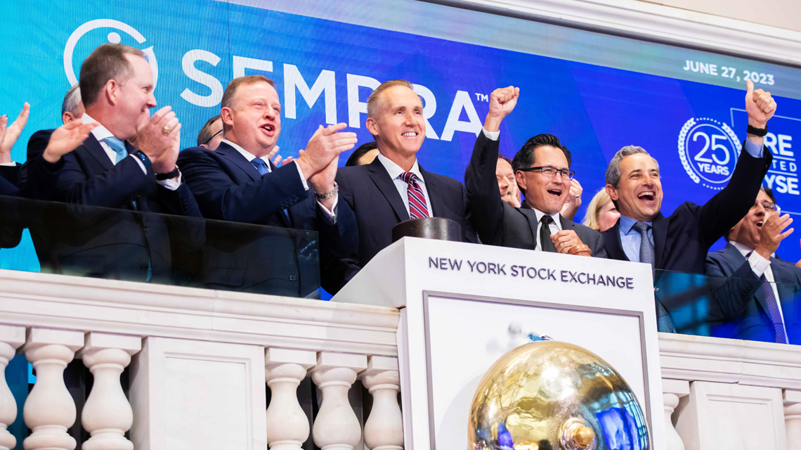 Sempra's executive team celebrates the company's 25th anniversary by ringing the opening bell at the New York Stock Exchange