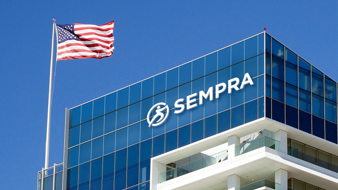 Sempra's logo at the top of the headquarters building in San Diego, CA, USA