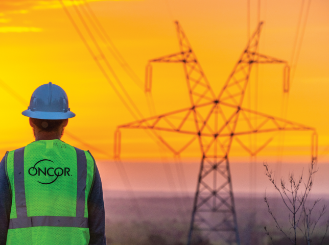 Person in foreground with powerlines in background